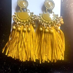 Gorgeous statement pierced earrings.